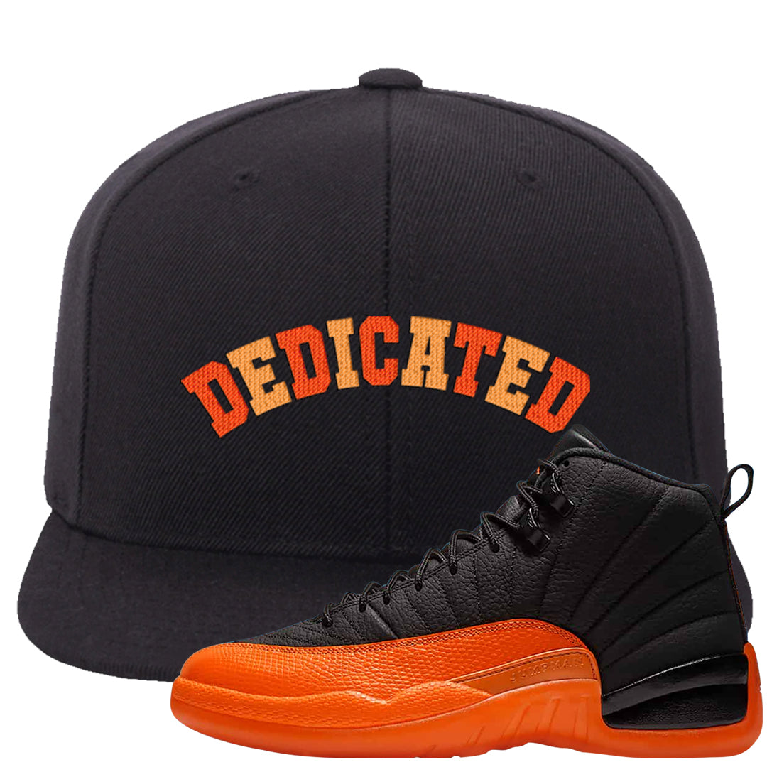 Brilliant Orange 12s Snapback Hat | Dedicated, Black