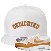 Bronze 1s Snapback Hat | Dedicated, White