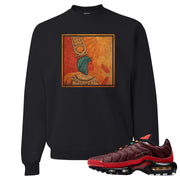 printed on the front of the air max plus sunburst sneaker matching black crewneck sweatshirt is the vintage egyptian logo