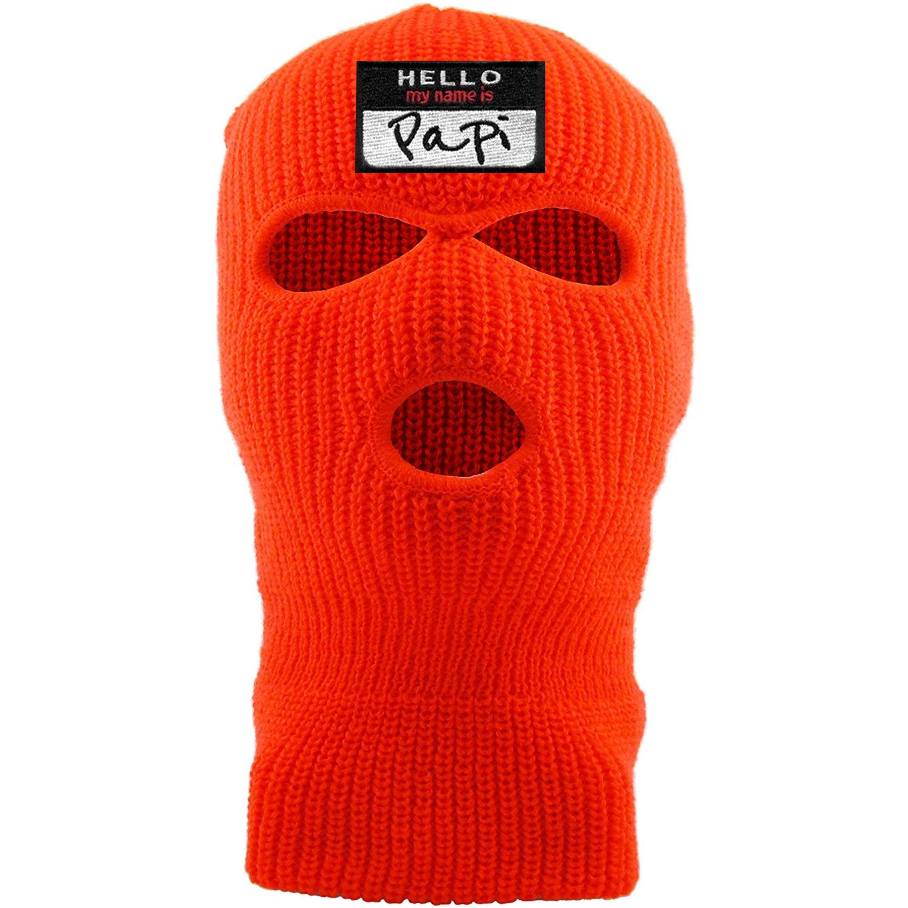 embroidered on the front of the safety orange hello my name is papi ski mask is the hello my name is papir logo embroidered in white, black, and red