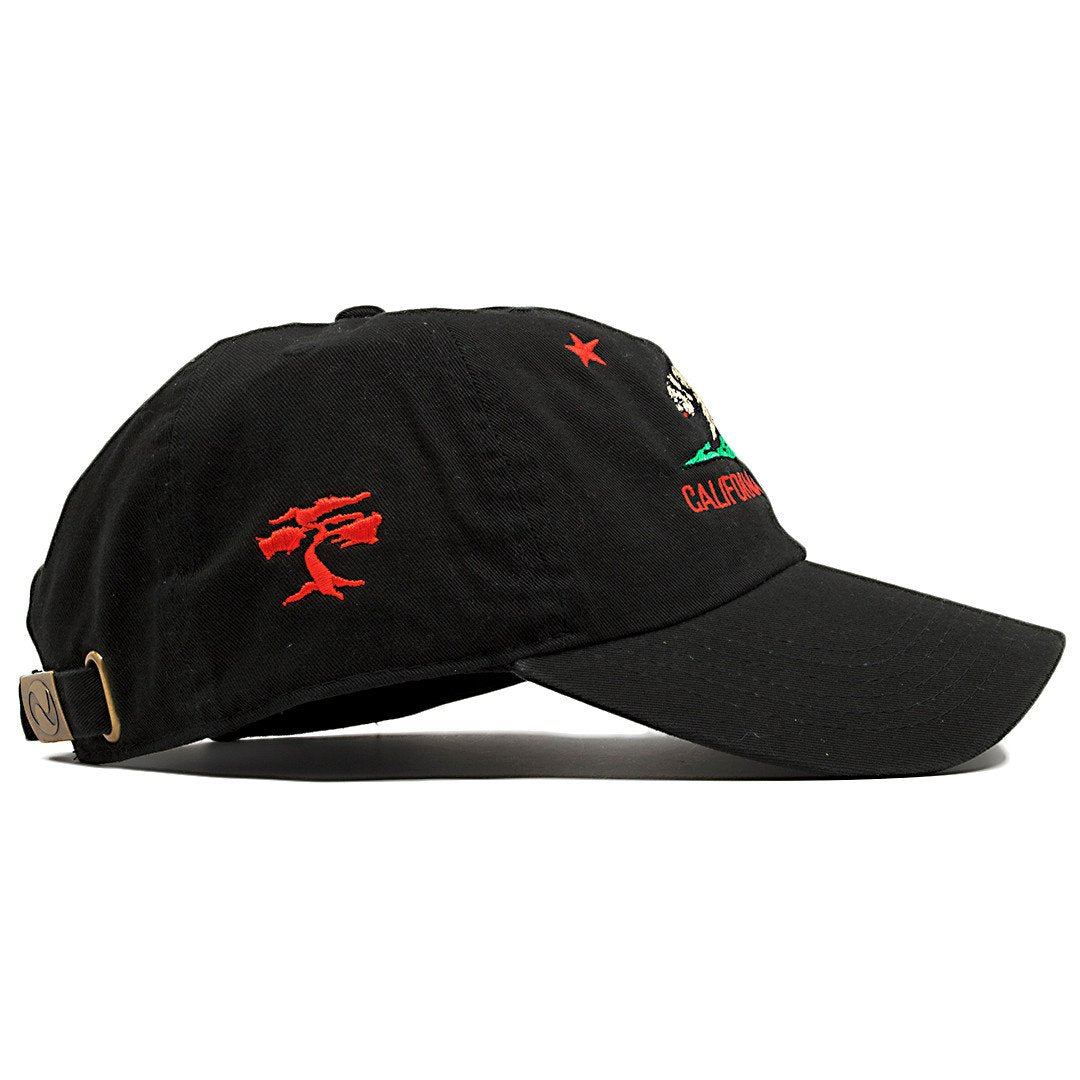 On the wearer's right side of the Foot Clan California Republic Cali Bear dad hat the Foot Clan Bonsai Tree is embroidered in red.