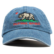 The light denim California Republic Cali Bear dad hat features the California Republic logo embroidered on the front of a denim dad hat in green, brown and red.