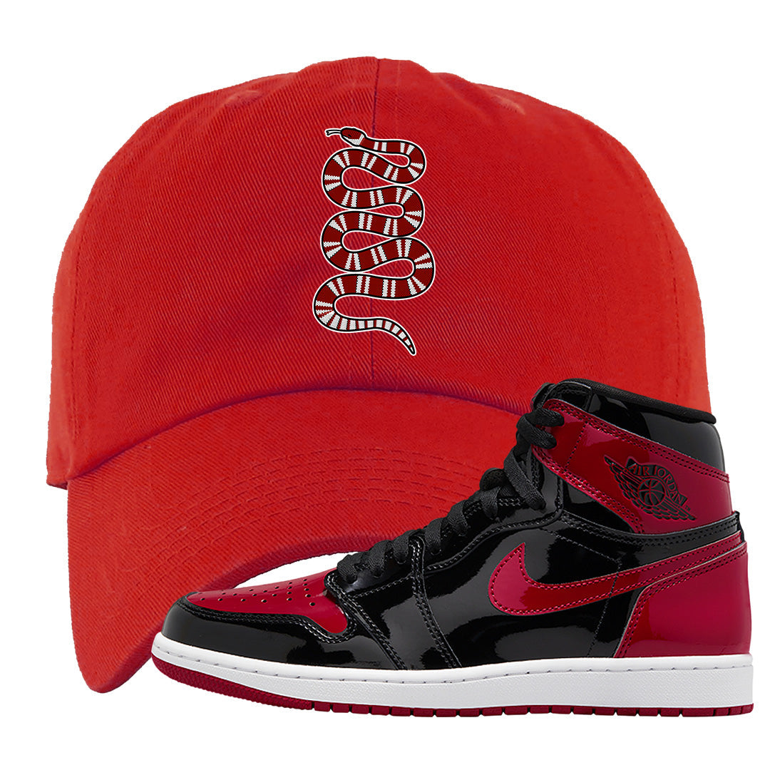 Patent Bred 1s Dad Hat | Coiled Snake, Red