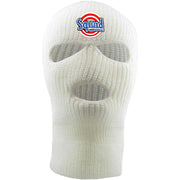 Embroidered on the forehead of the white squad ski mask is the squad logo in red, white, and blue