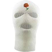 Embroidered on the forehead of the white three hole rosebud ski mask is the rosebud logo in red, green, and gold