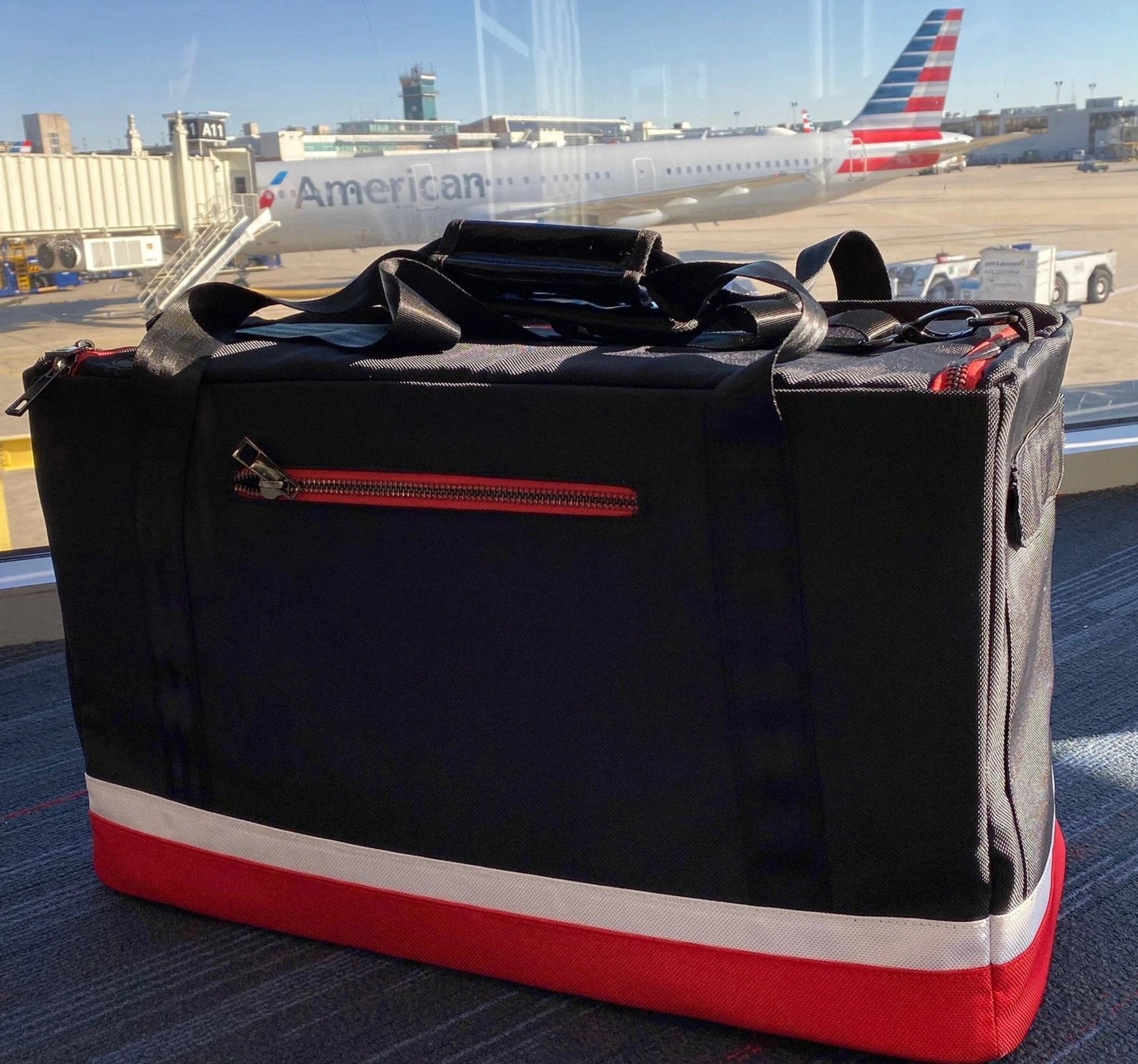 Flight Pack Sneaker Duffle Bag in front of an Air Plane