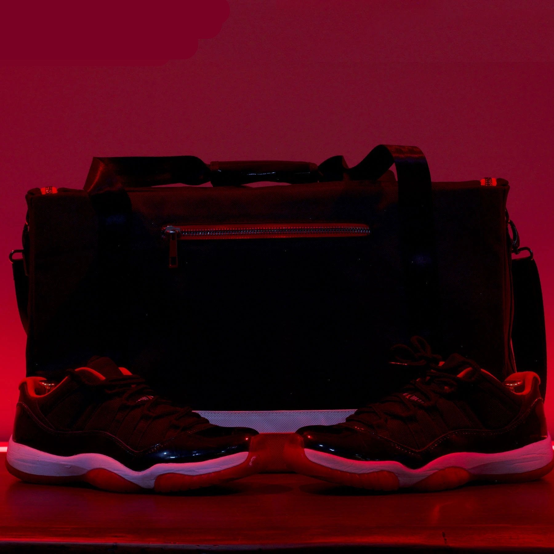 Match your Bred 11s with a sneaker matching Flight Pack sneaker Duffle Bag from Foot Clan