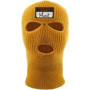 Embroidered on the front of the hello my name is mami timberland ski mask is the hello my name is mami logo embroidered in white, black, and red