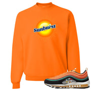 Printed on the front of the Air Max 97 Sunburst safety orange sneaker matching crewneck sweatshirt is the Sunburst Soda logo