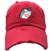 Embroidered on the front of the Chinese Take Out Box dad hat is a Chinese Take Out box embroidered in white, red, and black