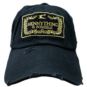 Embroidered on the front of the Hennything Is Possible black distressed dad hat, is the Hennything Is Possible logo in metallic gold thread