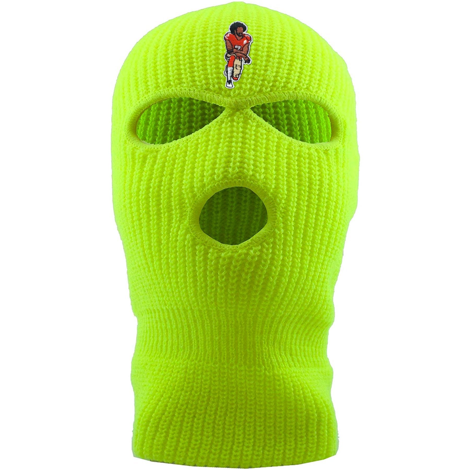 On the front of the kaepernick safety yellow ski mask is the colin kaepernick taking a knee logo