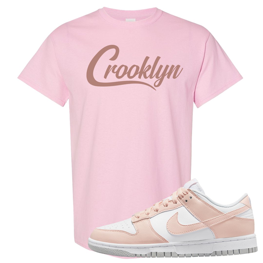 Next Nature Pale Citrus Low Dunks T Shirt | Crooklyn, Light Pink