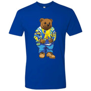 Printed on the front of the Air Jordan 5 Laney Alternate JSP sneaker matching t-shirt is the Sweater Bear wearing a Coogi sweater that matches the colorway of the Jordan 5 Laneys