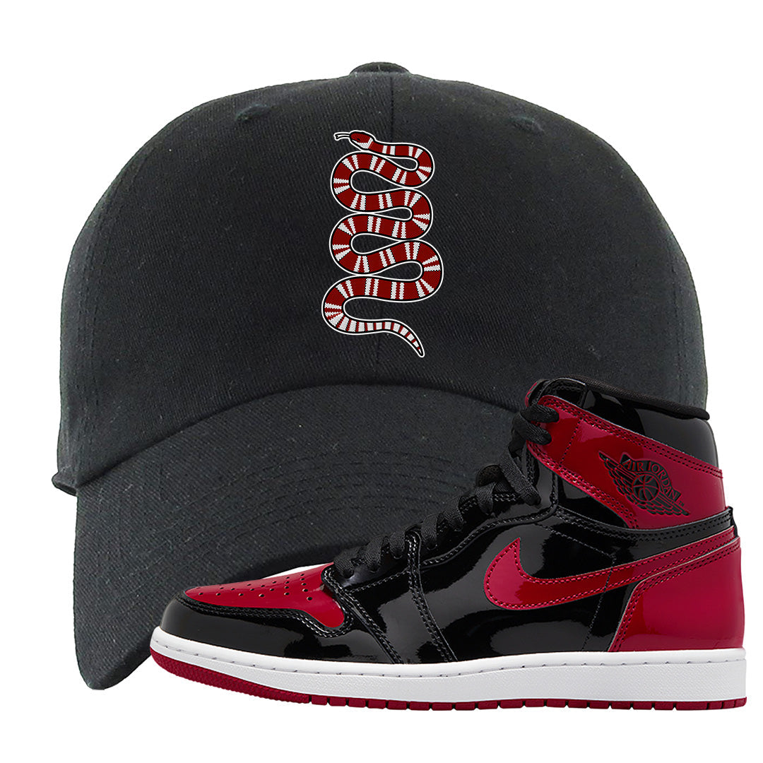 Patent Bred 1s Dad Hat | Coiled Snake, Black