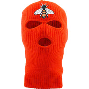 Embroidered on the front of the bumblebee safety orange ski mask is the bumble bee logo embroidered in red, white, black, and gold