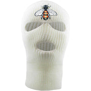 Embroidered on the front of the bumblebee white ski mask is the bumble bee logo embroidered in red, white, black, and gold