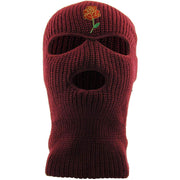 Embroidered on the front of the maroon rose bud ski mask is the Rose bud logo in green, red, gold 
