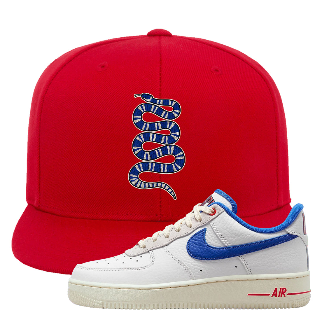 University Blue Summit White Low 1s Snapback Hat | Coiled Snake, Red