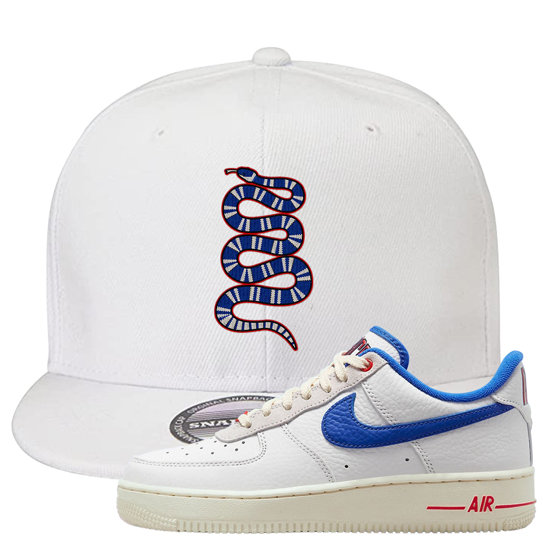 University Blue Summit White Low 1s Snapback Hat | Coiled Snake, White