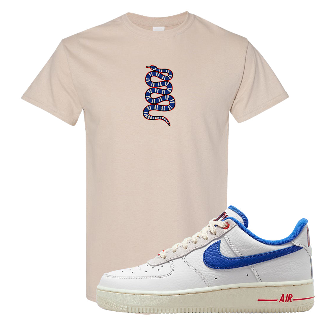 University Blue Summit White Low 1s T Shirt | Coiled Snake, Sand