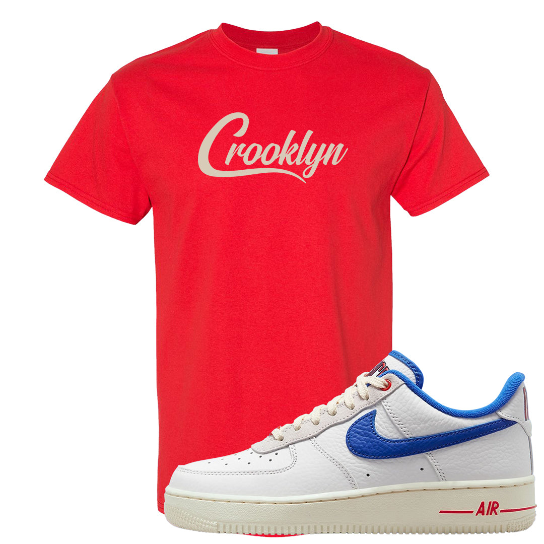 University Blue Summit White Low 1s T Shirt | Crooklyn, Red