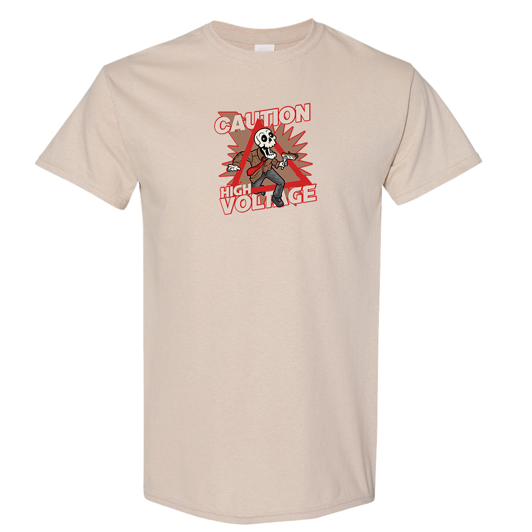 Pale Ivory Picante Red 90s T Shirt | Caution High Voltage, Sand