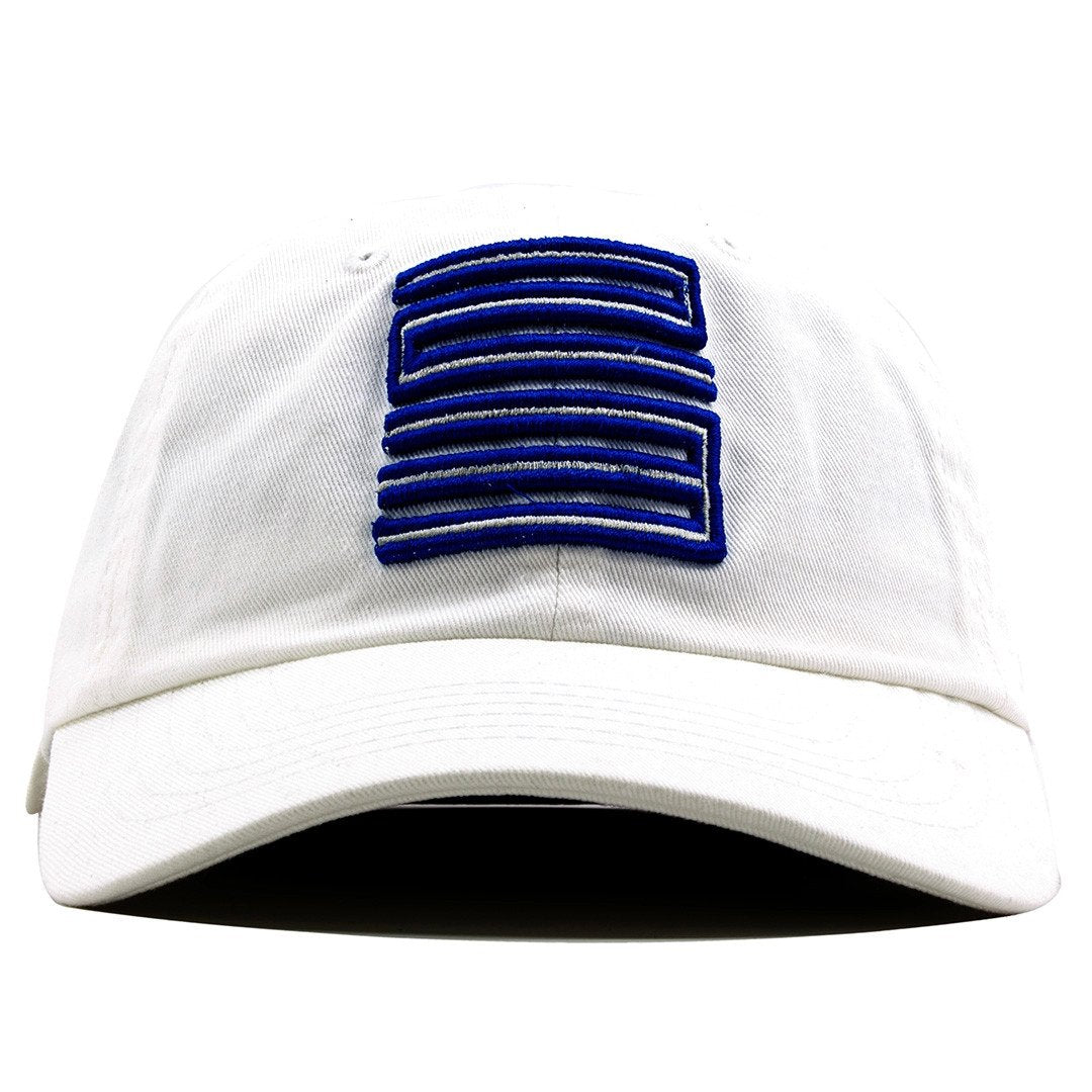 the white french blue jordan 12 matching 23 ball cap dad hat is solid white and has white and blue 23 jordan logo embroidered on the front