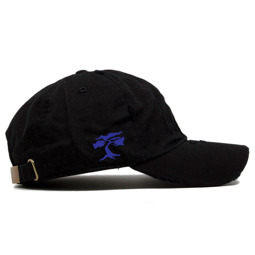 on the wearer's right side of the space jam squad distressed dad hat the foot clan bonsai logo is embroidered in blue