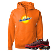 printed on the front of the air max plus sunburst sneaker matching safety orange pullover hoodie is the sunburst soda logo