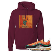 Printed on the front of the Air Max 97 Sunburst maroon sneaker matching pullover hoodie is the Vintage Egyptian logo