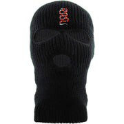 Embroidered on the forehead of the black coiled snake ski mask is the snake logo in red, white, and black