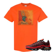 printed on the front of the air max plus sunburst sneaker matching safety orang tee shirt is the vintage egyptian logo