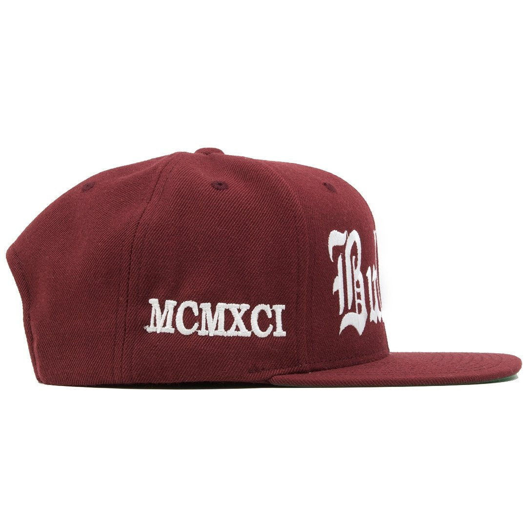 on the right side of the bullies retro jordan 6 maroon matching snapback MCMXCI is embroidered in white