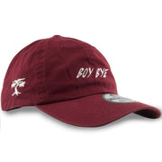 embroidered on the right side of the Boy Bye Maroon Adjustable Baseball Cap is the Foot Clan bonsai tree logo embroidered in white