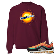 Printed on the front of the Air Max 97 Sunburst maroon sneaker matching crewneck sweatshirt is the Sunburst Soda logo