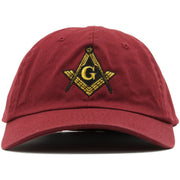 The Free Masons Illuminati Dad Hat has the Free Mason logo embroidered on the front in metallic gold and black.
